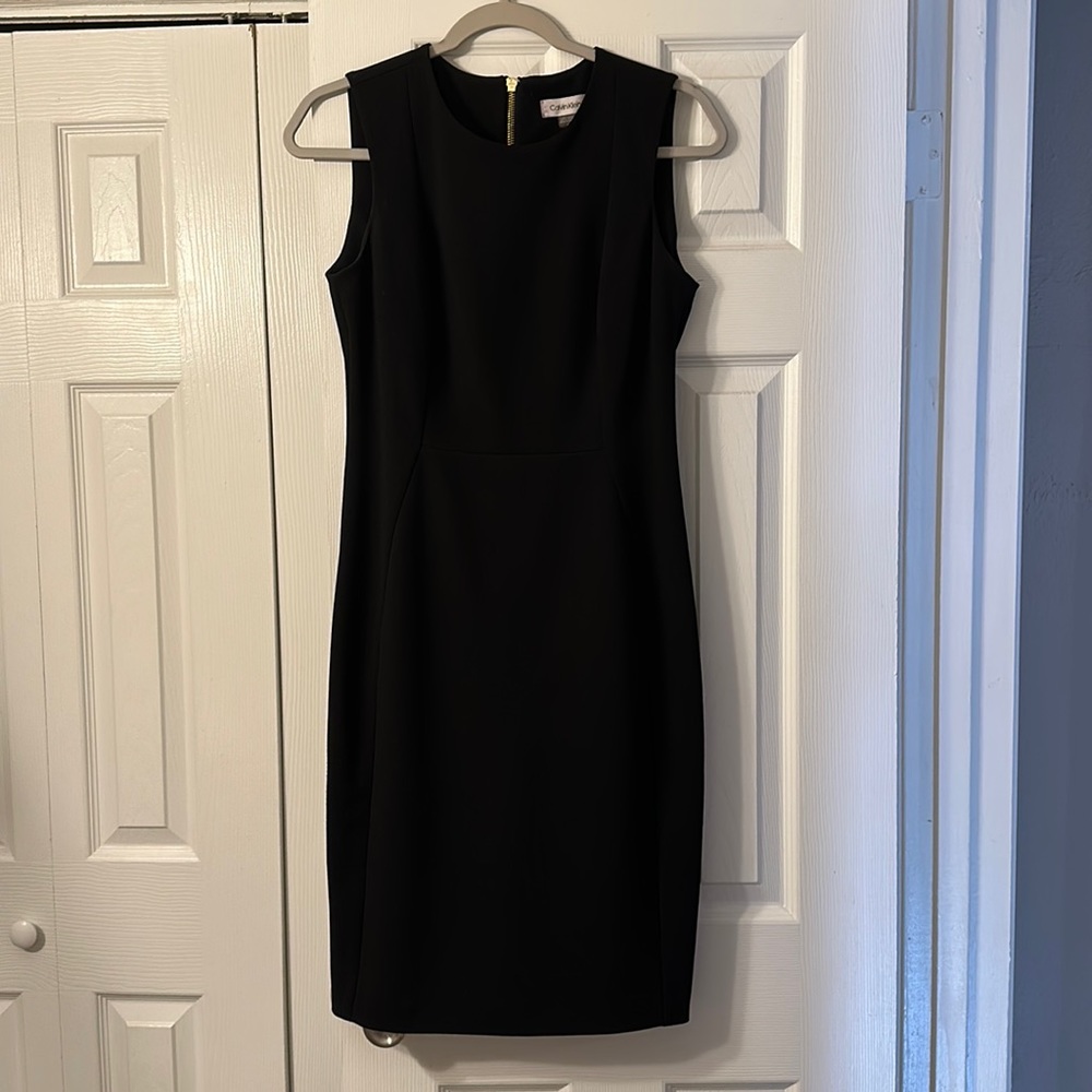 Calvin Klein. Size 6. Polyester and spandex. Worn once. Non-smoking home.